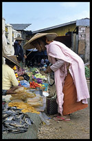 A Burmese nun at the Zeigyo (Central Market).