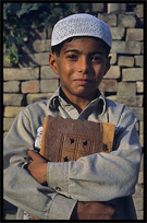 A young boy at the local mosque. Taxila, Pakistan