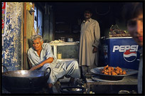 A small shop selling Pakistani food and Pepsi. Taxila, Pakistan