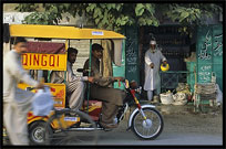 Local transport, motor-rickshaws and bicycle. Taxila, Pakistan