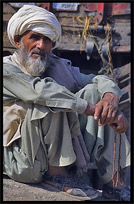 Portrait of an Afghan refugee at the Afghan horse market. Peshawar, Pakistan