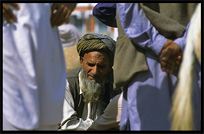 Portrait of an Afghan refugee at the Afghan horse market. Peshawar, Pakistan