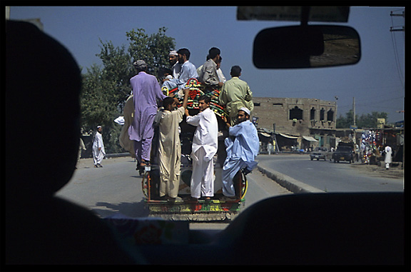 Pakistani transport, overcrowded motor-rickshaws. Peshawar, Pakistan