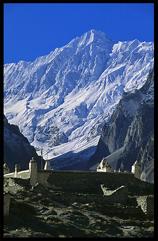 The old cemetery with Diran (7270m) in the background. Karimabad, Hunza, Pakistan