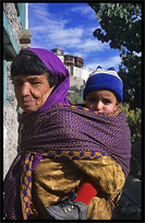 Portrait of a woman with her child. Karimabad, Hunza, Pakistan