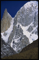 A black pinnacle, Bubulimating (6000m) also called Lady Finger. Karimabad, Hunza, Pakistan