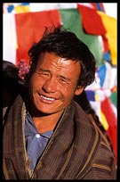 Tibetan pilgrim in front of the Jokhang. Lhasa, Tibet, China