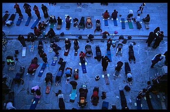 Pilgrims prostrating in front of the Jokhang early in the morning.