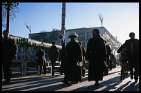 A continuous flow of Tibetan pilgrims on the Barkhor Kora. Lhasa, Tibet, China