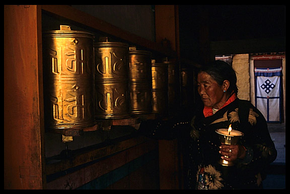 Prayer wheels, yak-butter lamps, a pilgrim and the ethernal knot.