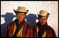 Young cowboy-style Tibetan pilgrims. Lhasa, Tibet, China