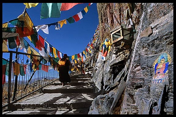 Pilgrims climbing a small hill on the Lingkhor Kora.