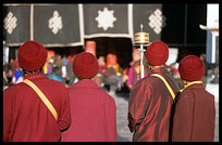 Tibetan pilgrims near the entrance of the Jokhang. Lhasa, Tibet, China