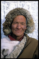 An old Tibetan pilgrim visiting Lhasa on the Lingkhor Kora. Lhasa, Tibet, China