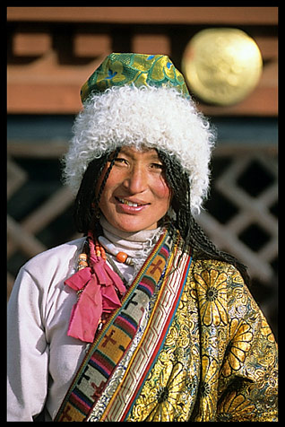 Traditional Tibetan dress in front of the Jokhang.