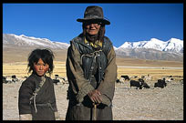 An old Tibetan pilgrim and her daughter on the road from Lhasa to lake Nam Tso. Nam Tso, Tibet, China