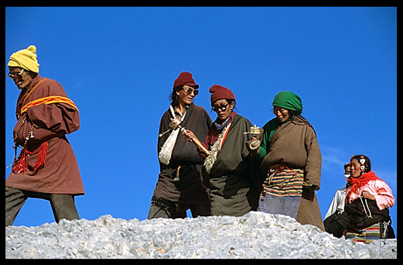 A colourful family of pilgrims walking the Nam Tso Kora.