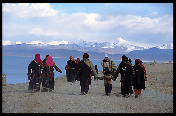 A family of pilgrims walking the Nam Tso Kora.