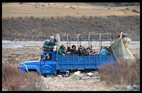 Pilgrims in a truck on their way to Reting monastery. Tibet, China