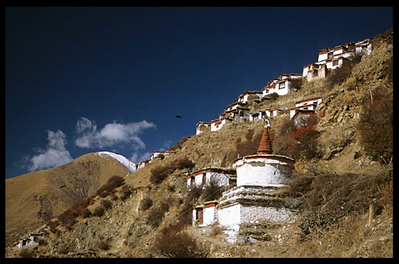 The Kora at Drigung Til monastery heads up the hill to the main drtro, the holiest sky-burial site in the Lhasa region. 